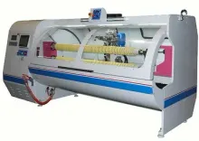 Two Shafts Auto Cutting Machine for various adhesive tapes such as OPP, Masking, Double-sided, PVC, Medical Tape, Foam tape, etc.